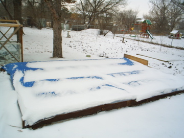 picture of snow-covered cold frame